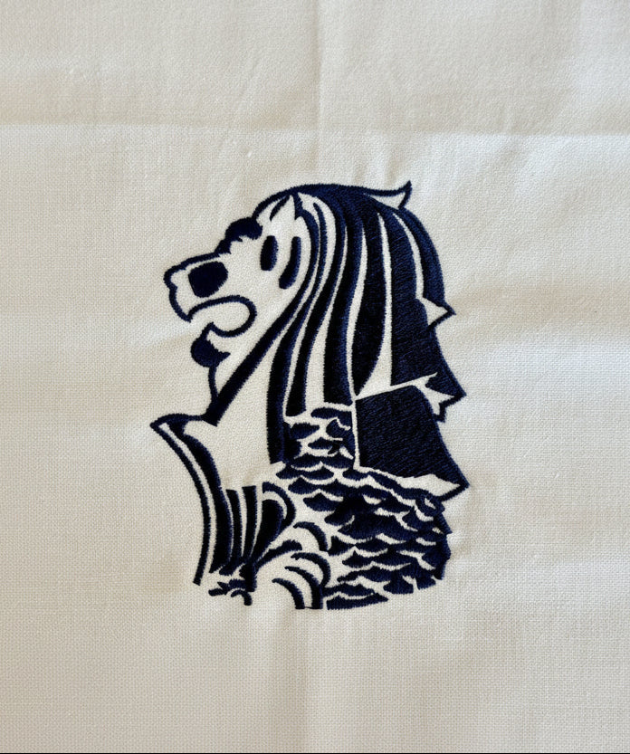 Navy blue Singapore merlion embroidery on white tea towel