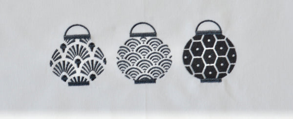 Tea towel with Grey Trio Set of Lanterns